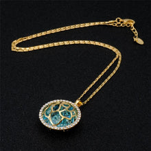 Load image into Gallery viewer, Gold Cutout Sphere with Blue Crystal Outer Ring and Zircon Necklace, Chain Length: 44cm - Mega Discount Store Ghana